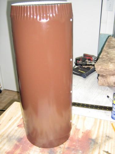 Two aluminum tube sections, nested. Notice pop-rivets and crimped end.