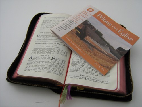 The same Word of God, underneath in a Missal respected for a lifetime, and on top in a �Prions en �glise� thrown away every week.