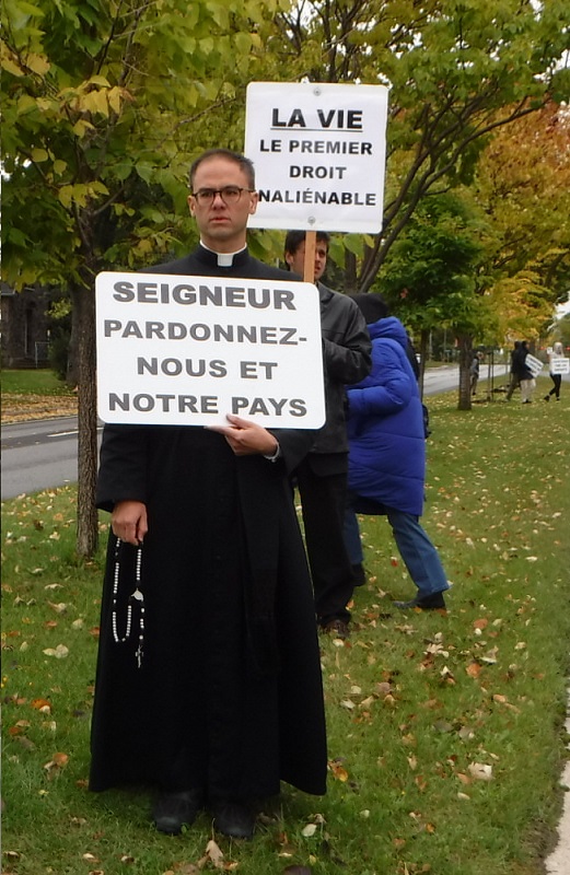 L'abb� Garrick Huang.